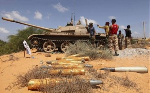 Anti-Gaddafi forces place tanks in position in Om El Khanfousa, east of Sirte, after liberating the area from Gaddafi's forces Photo: REUTERS/Esam Al-Fetori